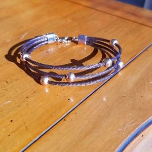 Brown wire bangle with gold beads and clasp